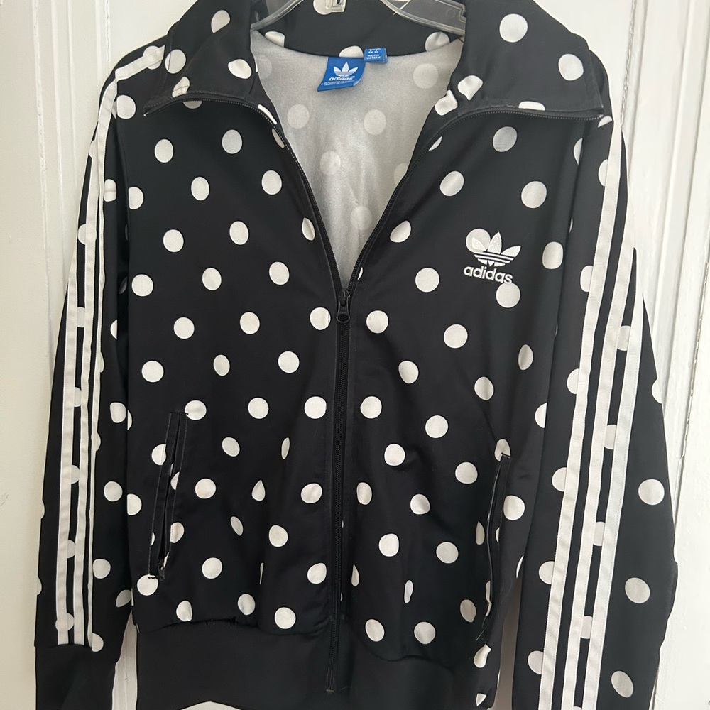 Polka dot Adidas zip up jacket.